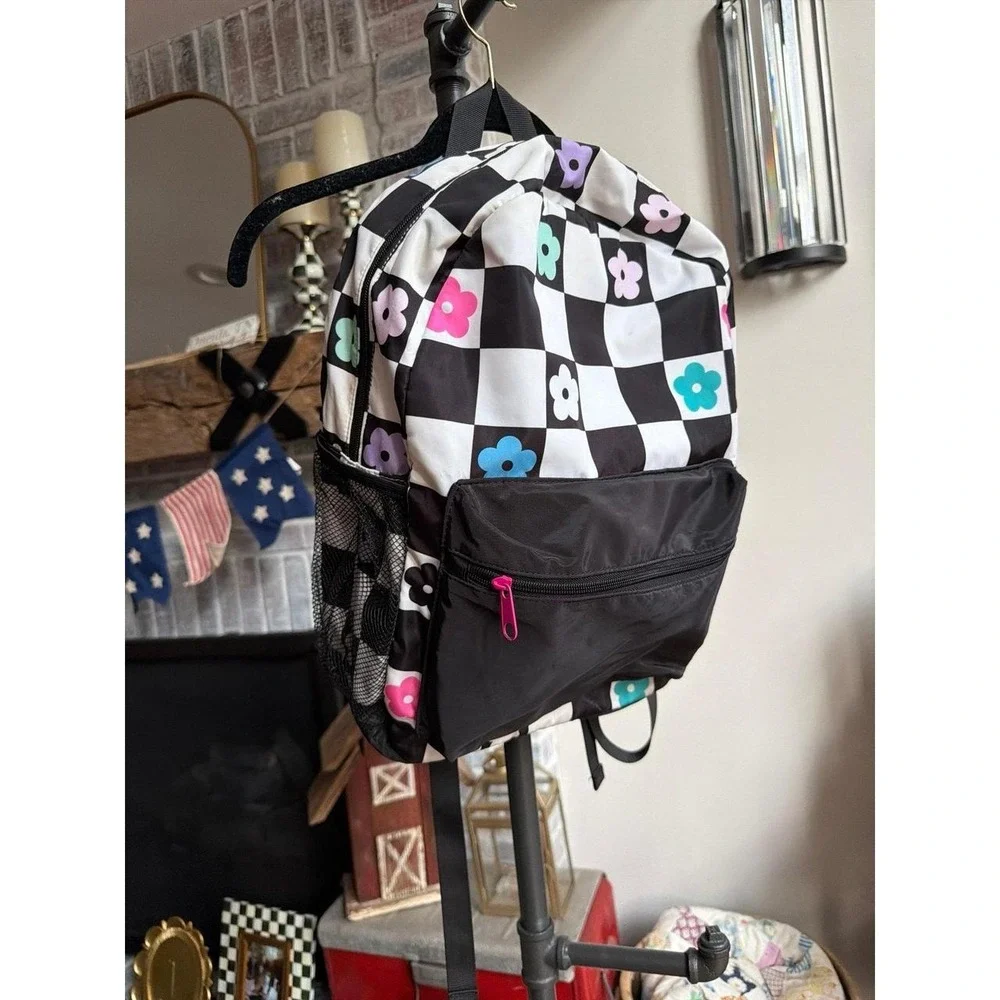 Claire's Checkered Daisy Small Backpack black-and-white checkerboard